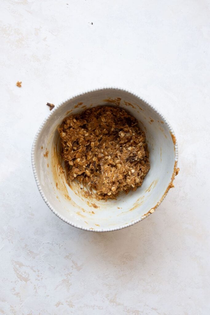 oatmeal walnut cookie dough in a bowl