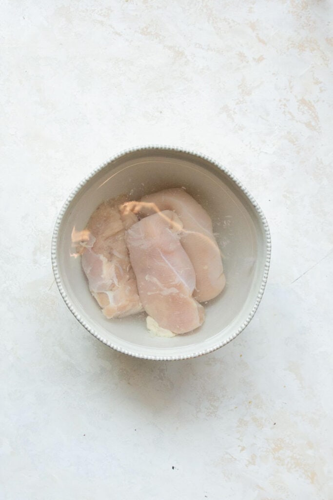 brining the chicken breasts in a salt water brine to make sure it is super juicy