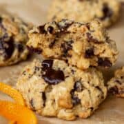Orange chocolate chip oatmeal cookies with chocolate chunks and made with almond flour.