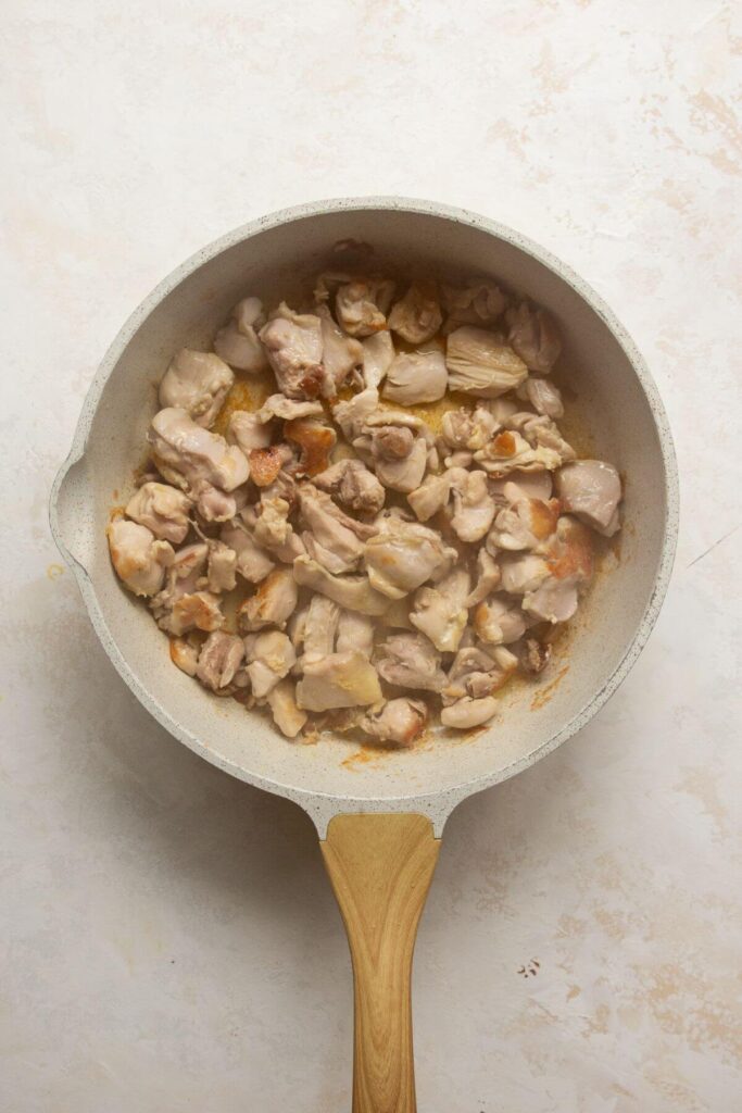 searing chicken thigh prices in olive oil in a pan