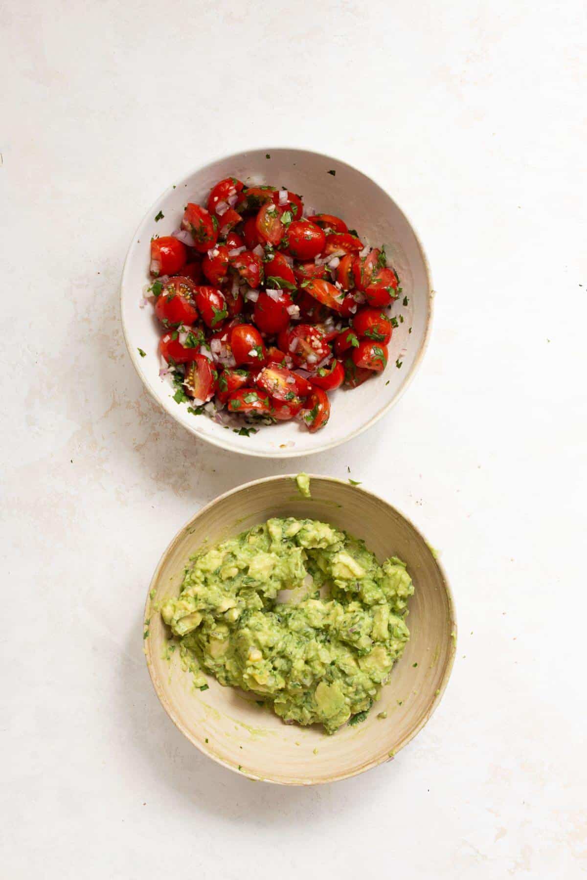 homemade salsa and guacamole in bowls
