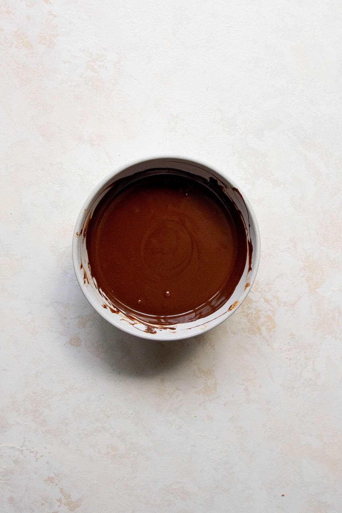 melted dark chocolate in a bowl