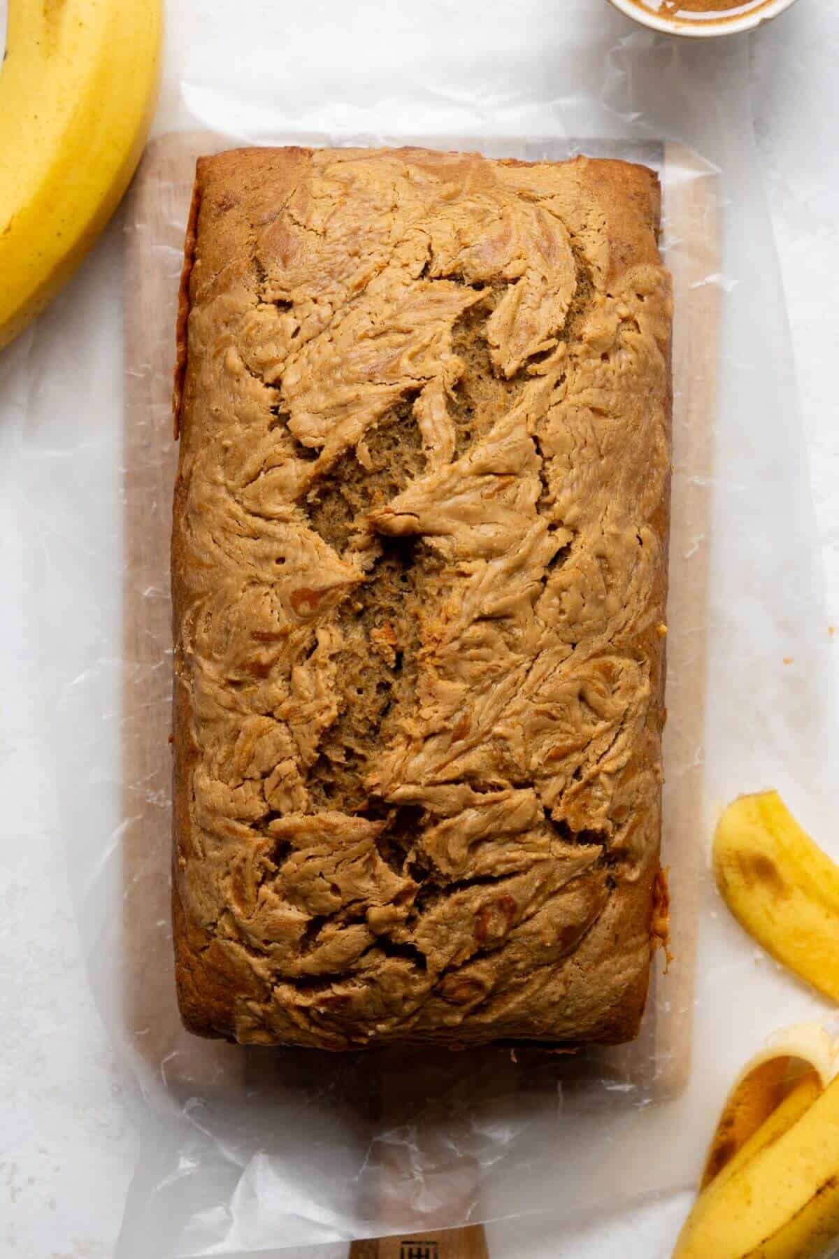 healthy peanut butter banana bread with a peanut butter swirl