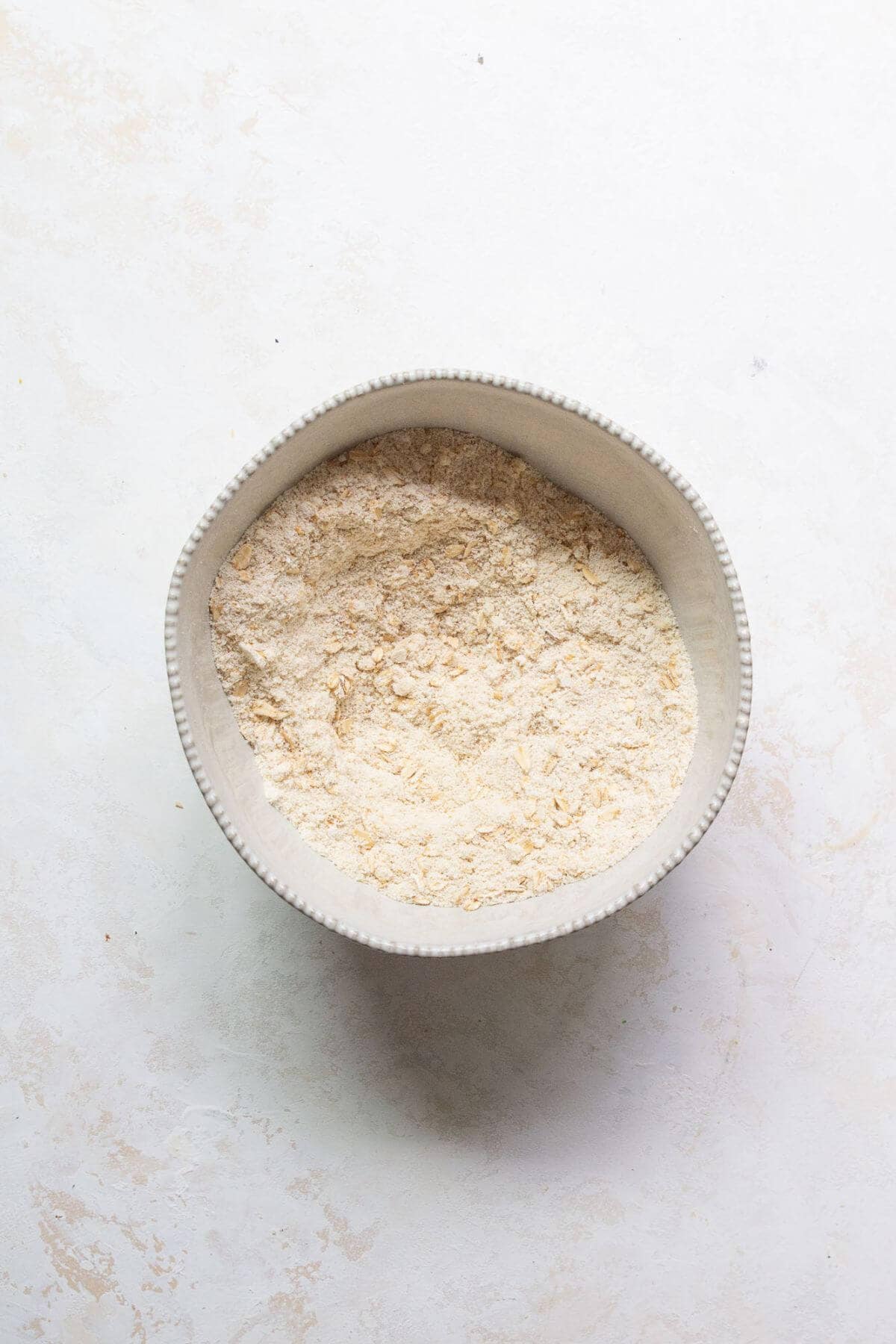 oat flour, almond flour, salt, baking soda, baking powder in a bowl whisked together