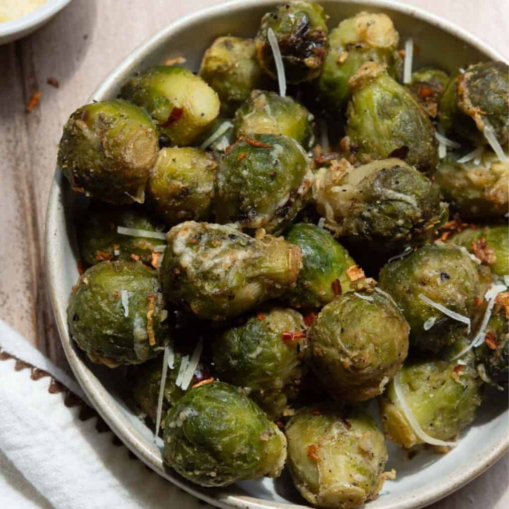 Crispy air fryer frozen Brussel sprouts with Parmesan.