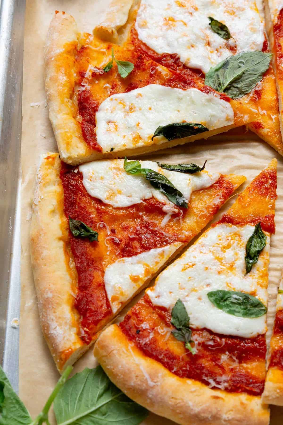 Cheesy pizza with healthy, high protein Greek yogurt pizza crust.