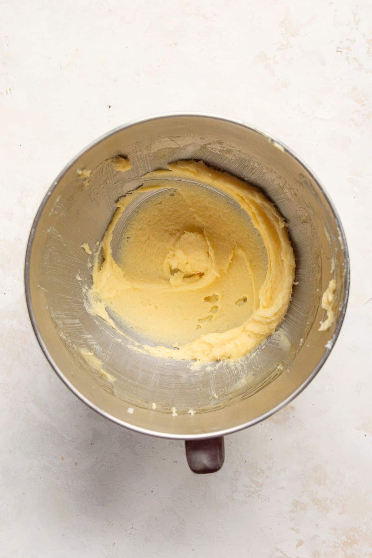 Butter and coconut oil creamed until smooth in a stand mixer bowl.