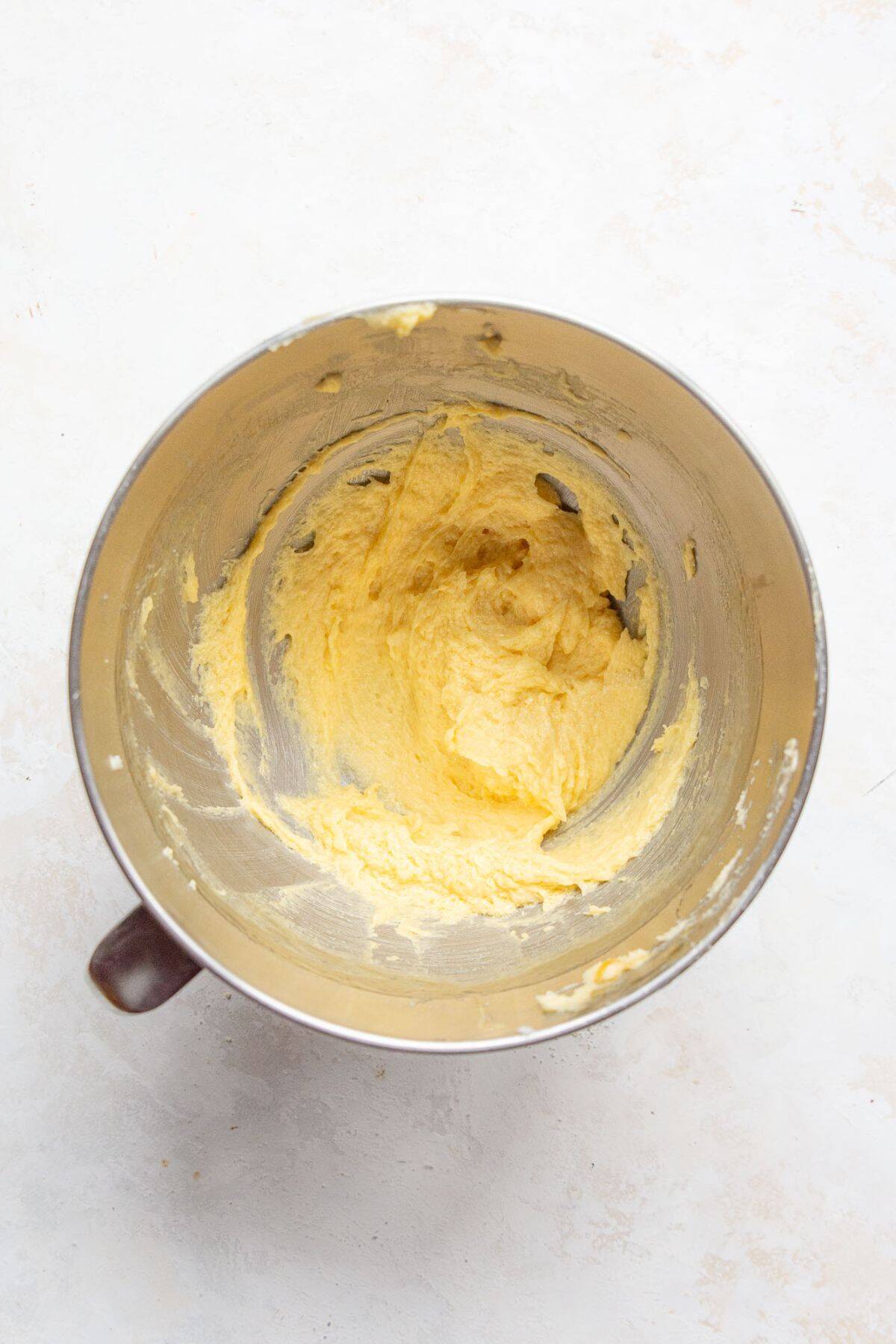 Egg and vanilla beaten into the creamed butter mixture.