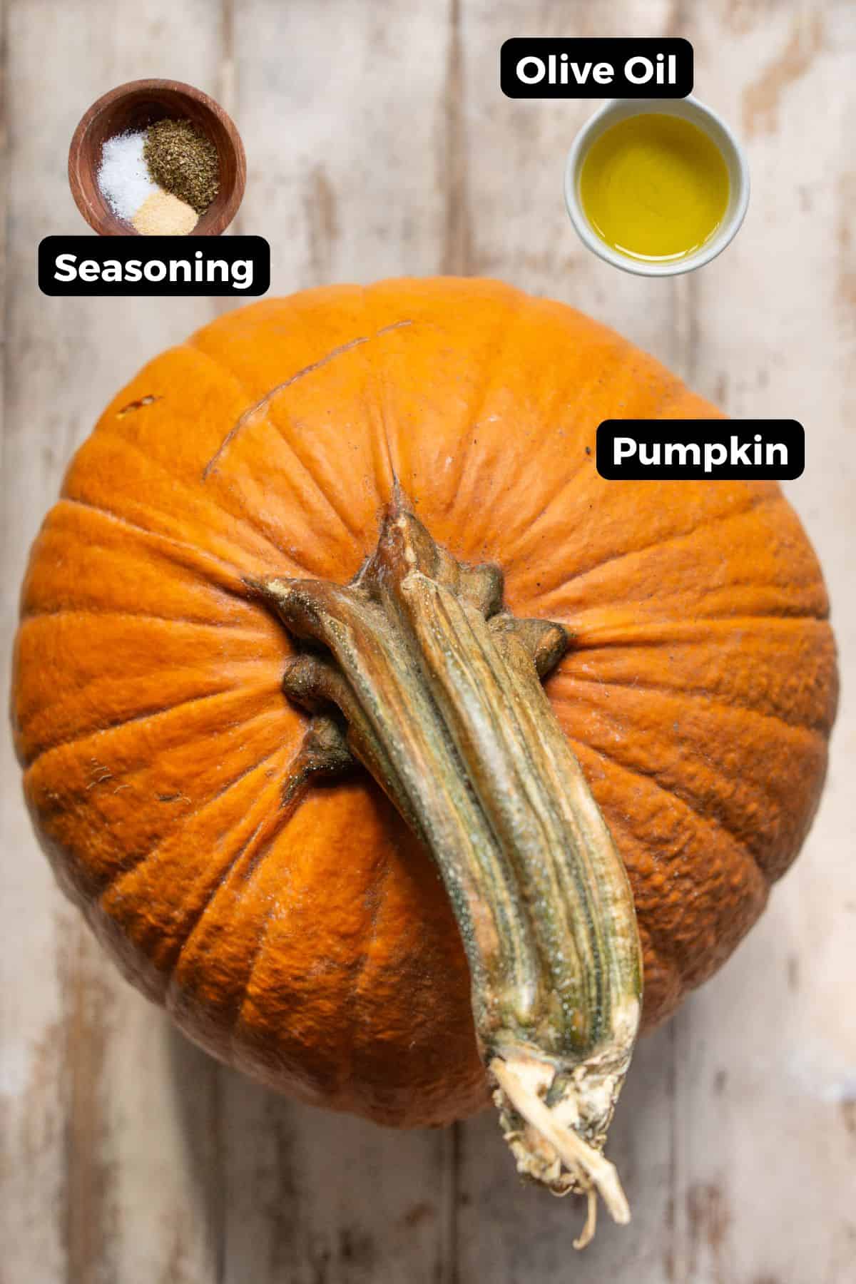 Savory air fryer pumpkin seed ingredients: pumpkin seeds, avocado oil, garlic powder, salt, and pepper.