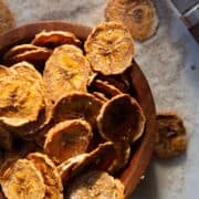Crispy cinnamon sugar air fryer banana chips, perfectly golden and dehydrated without oil.