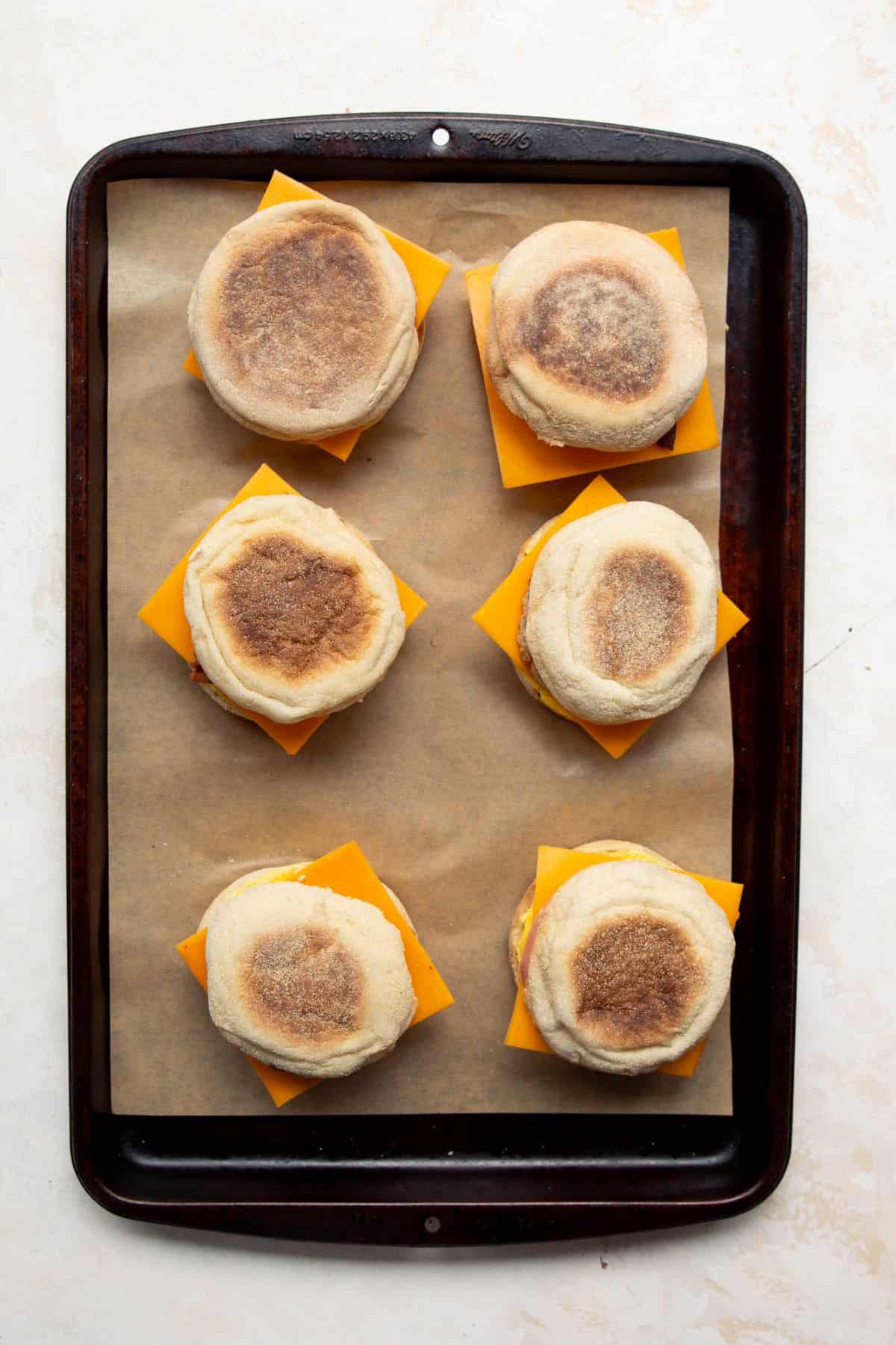 Assembled high-protein breakfast sandwiches ready for freezing.