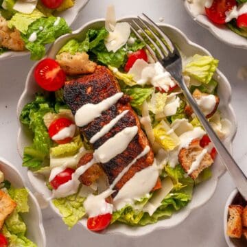 Crispy blackened salmon Caesar salad with healthy yogurt caesar dressing without mayo.