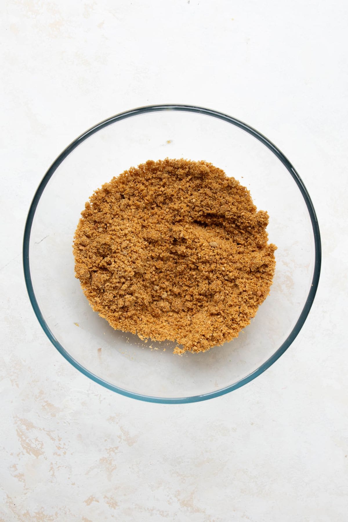 Gluten-free graham cracker, coconut sugar, and melted butter crumb mixture for key lime pie crust.