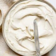 Thick and spreadable healthy cream cheese frosting made with maple syrup and Greek yogurt.