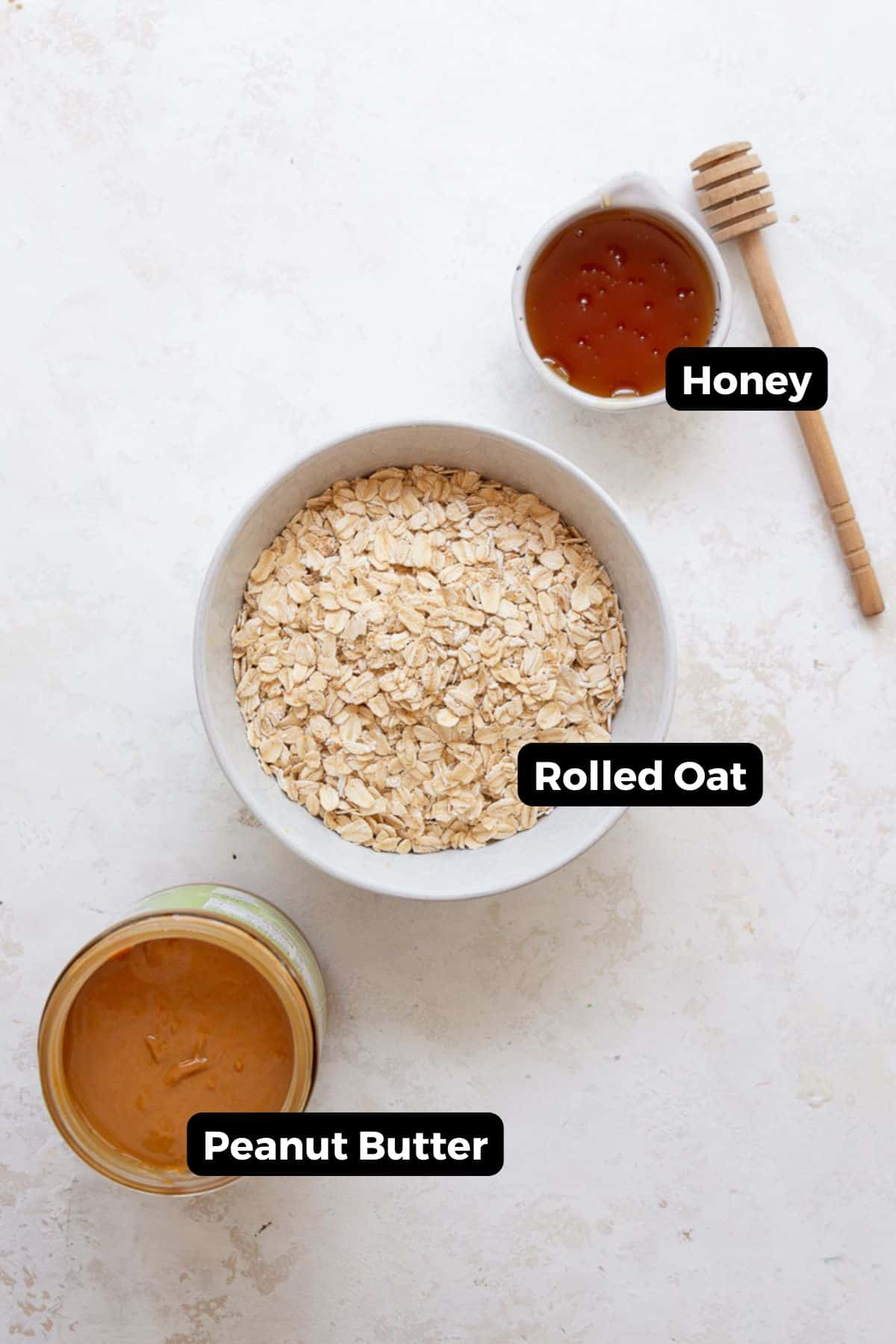 Ingredients in no bake peanut butter oatmeal balls, including: natural peanut butter, honey, and rolled oats.