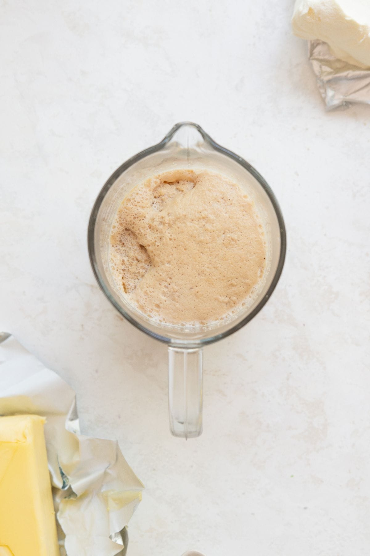 Instant yeast activated in warm almond milk and coconut sugar, foamy and bubbling.