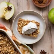 Healthy apple cinnamon baked oatmeal recipe topped with creamy yogurt.