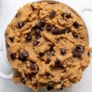 High-protein edible cookie dough made with whey protein and cottage cheese topped with mini chocolate chips.
