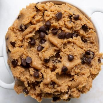 High-protein edible cookie dough made with whey protein and cottage cheese topped with mini chocolate chips.