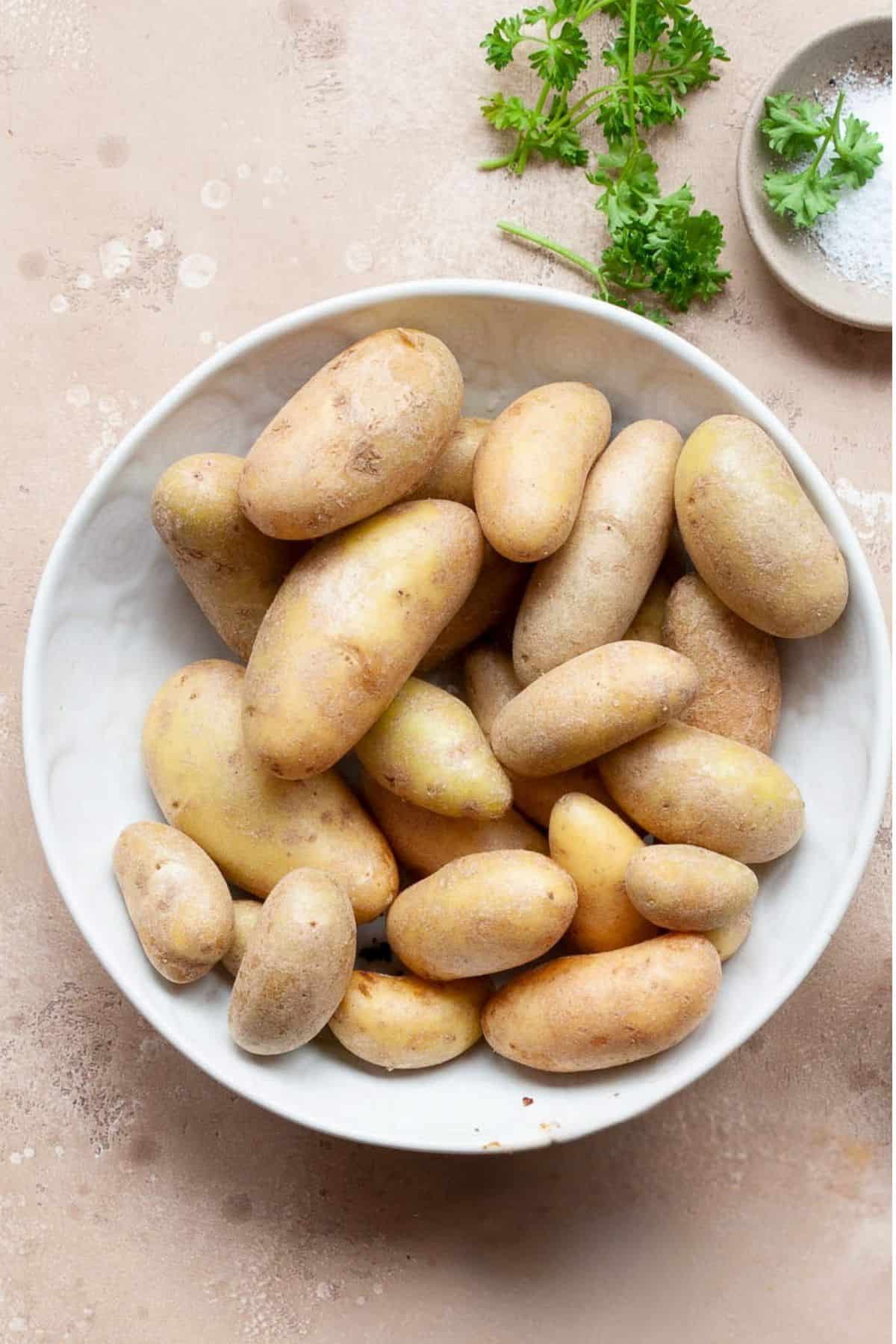 Scrubbed fingerling potatoes before boiling.