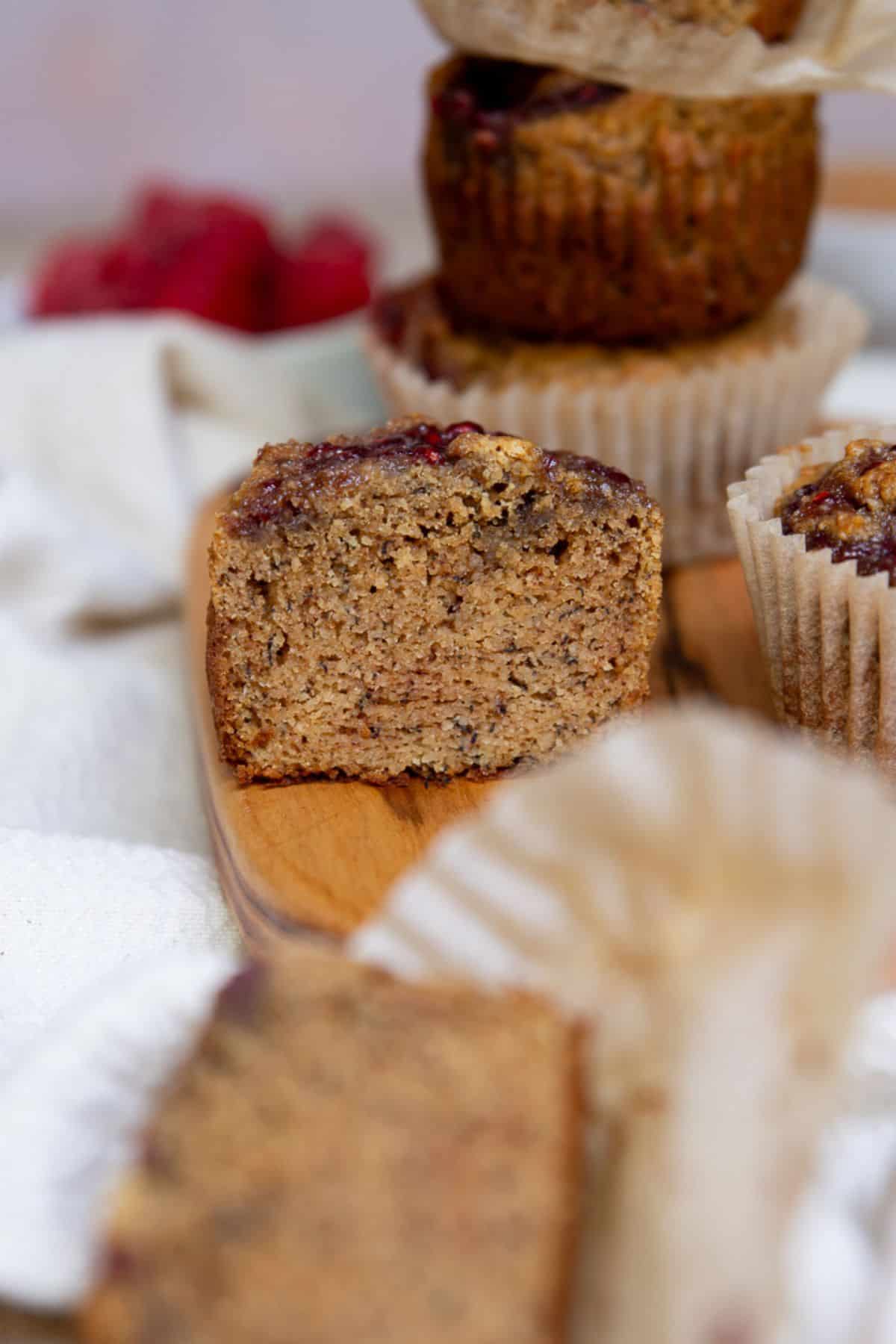 Inside peanut butter jelly banana muffins to show moist, fluffy, and soft texture.