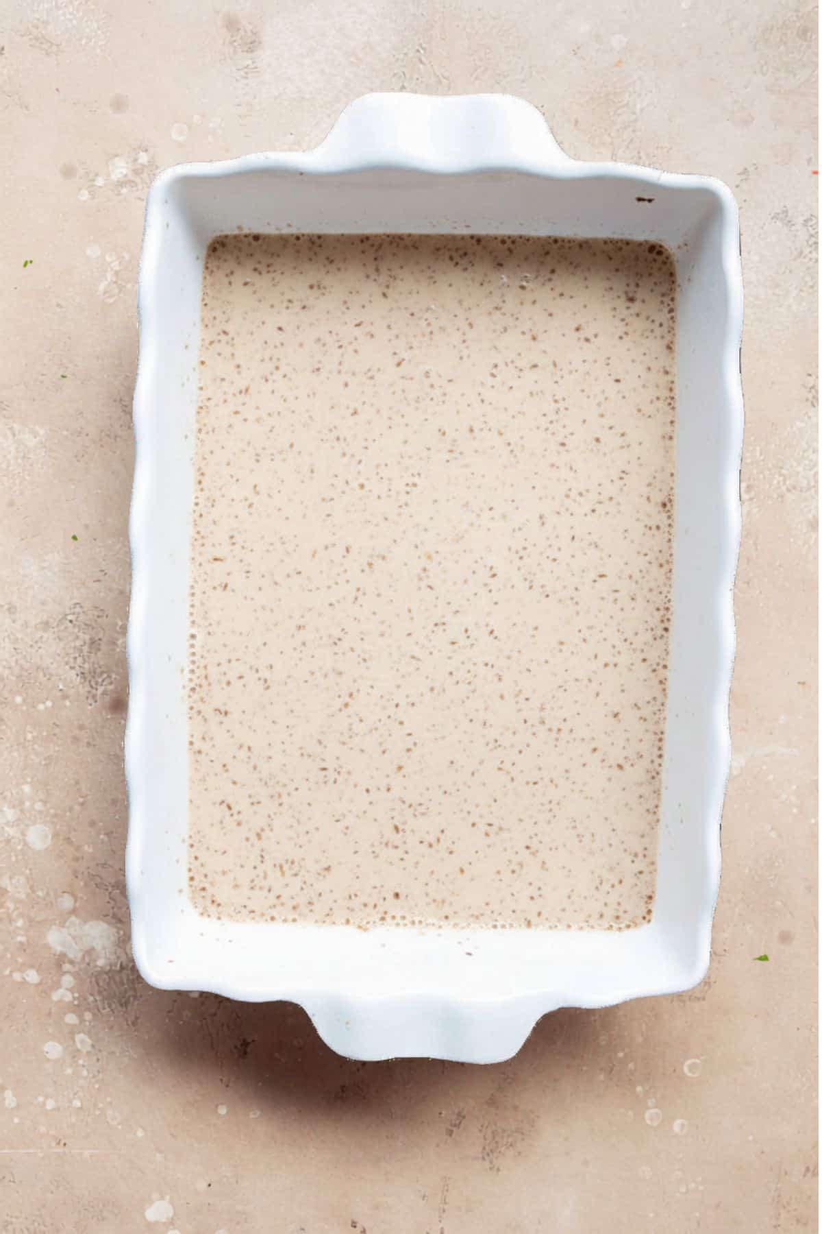 Whisk the eggs, egg whites, milk, cinnamon, and vanilla in a large shallow dish or casserole dish.