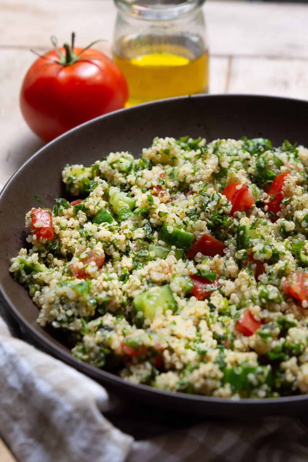 Mediterranean quinoa tabbouleh salad with fresh mint and parsley.