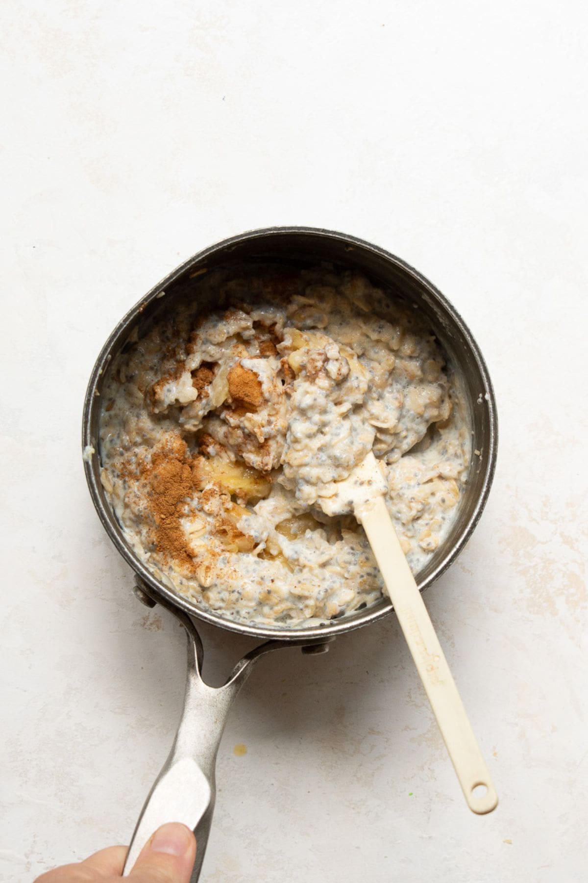 Cinnamon and mashed banana stirred into finished egg white oatmeal.