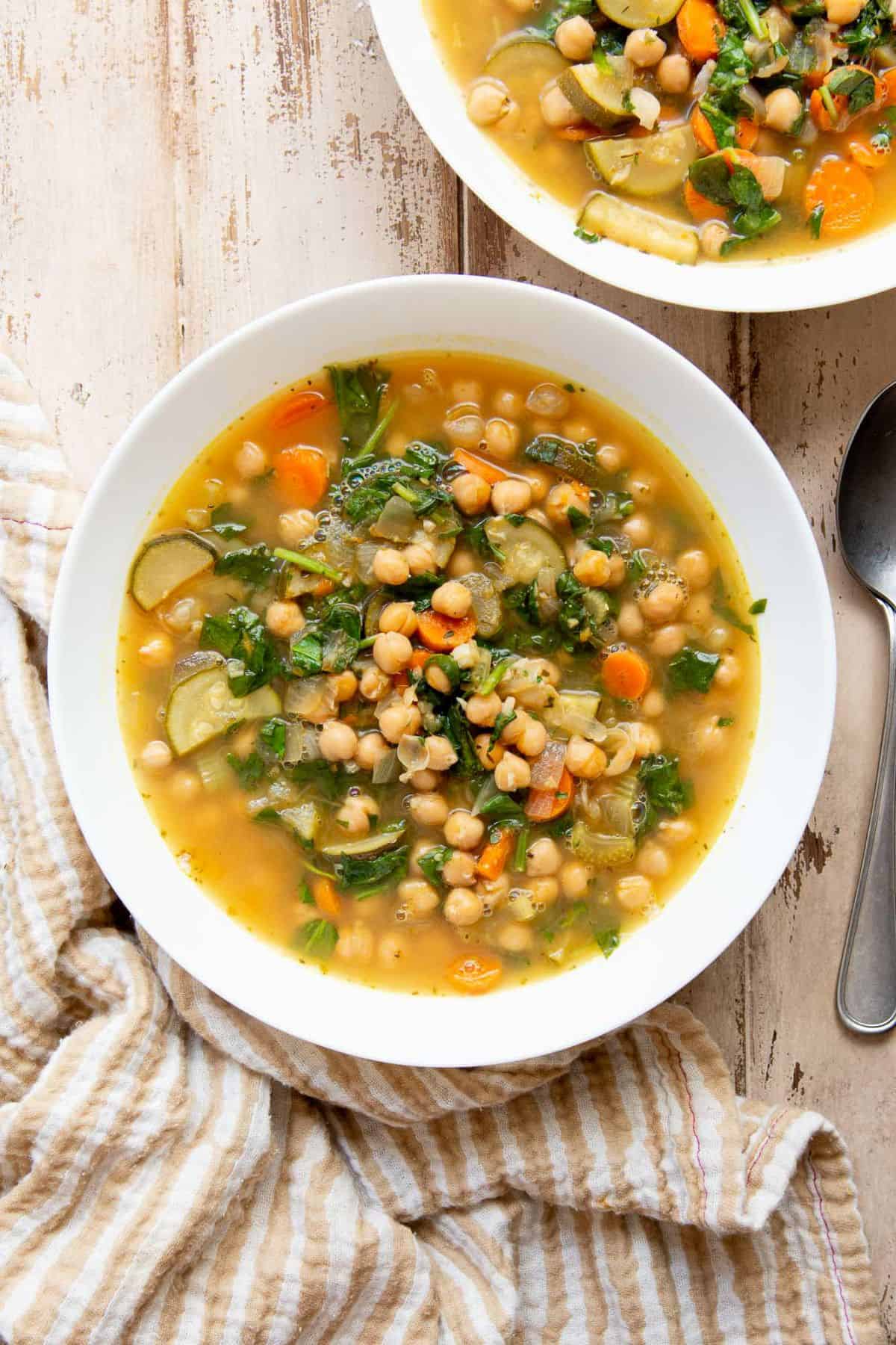 Serving Greek chickpea soup in a bowl.