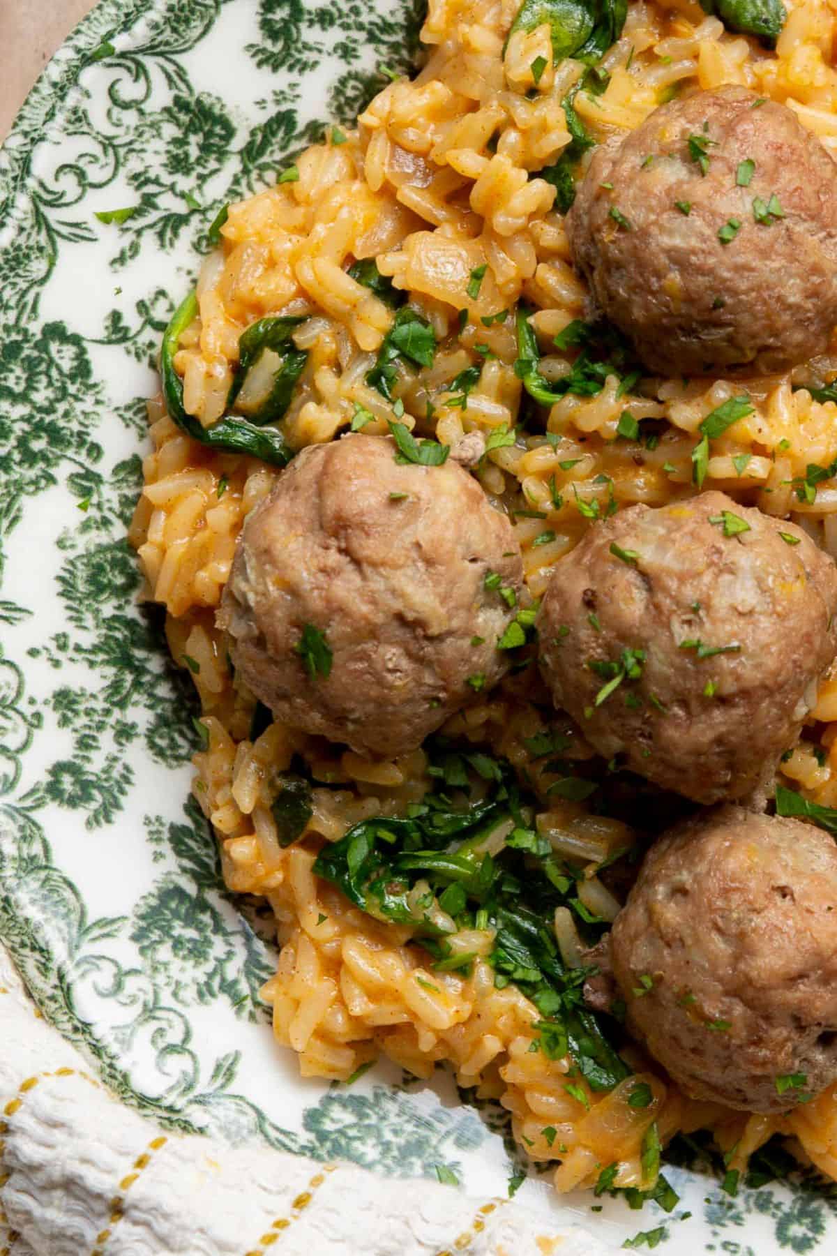Close up of juicy baked Greek turkey meatballs.