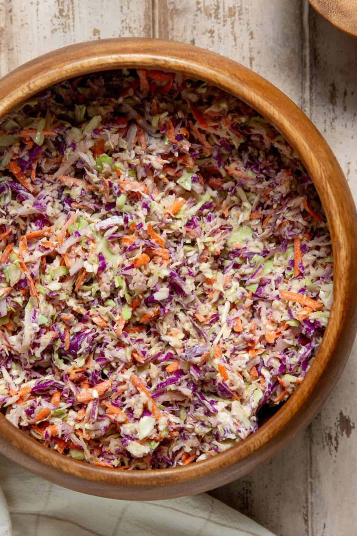 Overhead view of healthy coleslaw with Greek yogurt dressing.