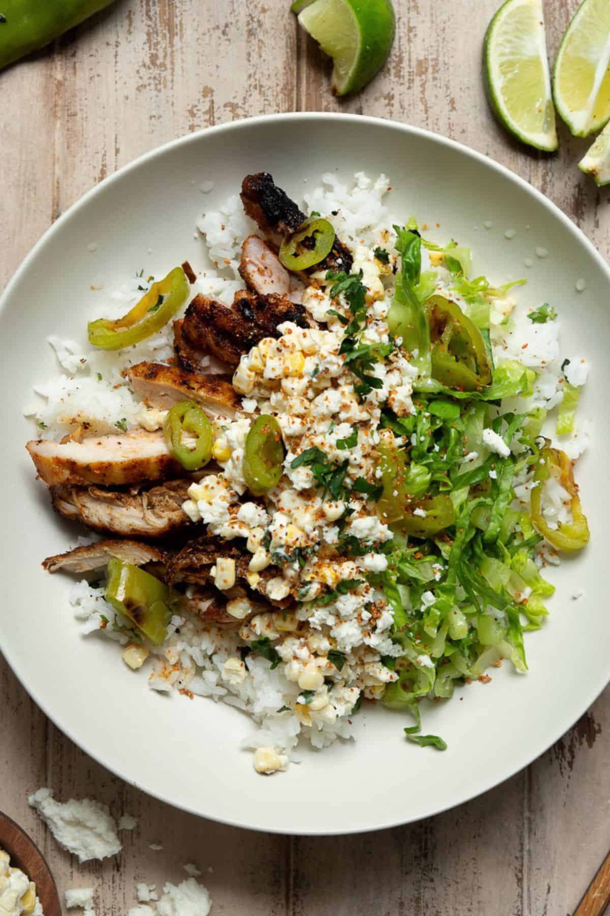 Healthy Mexican street corn chicken rice bowls with 45g of protein.