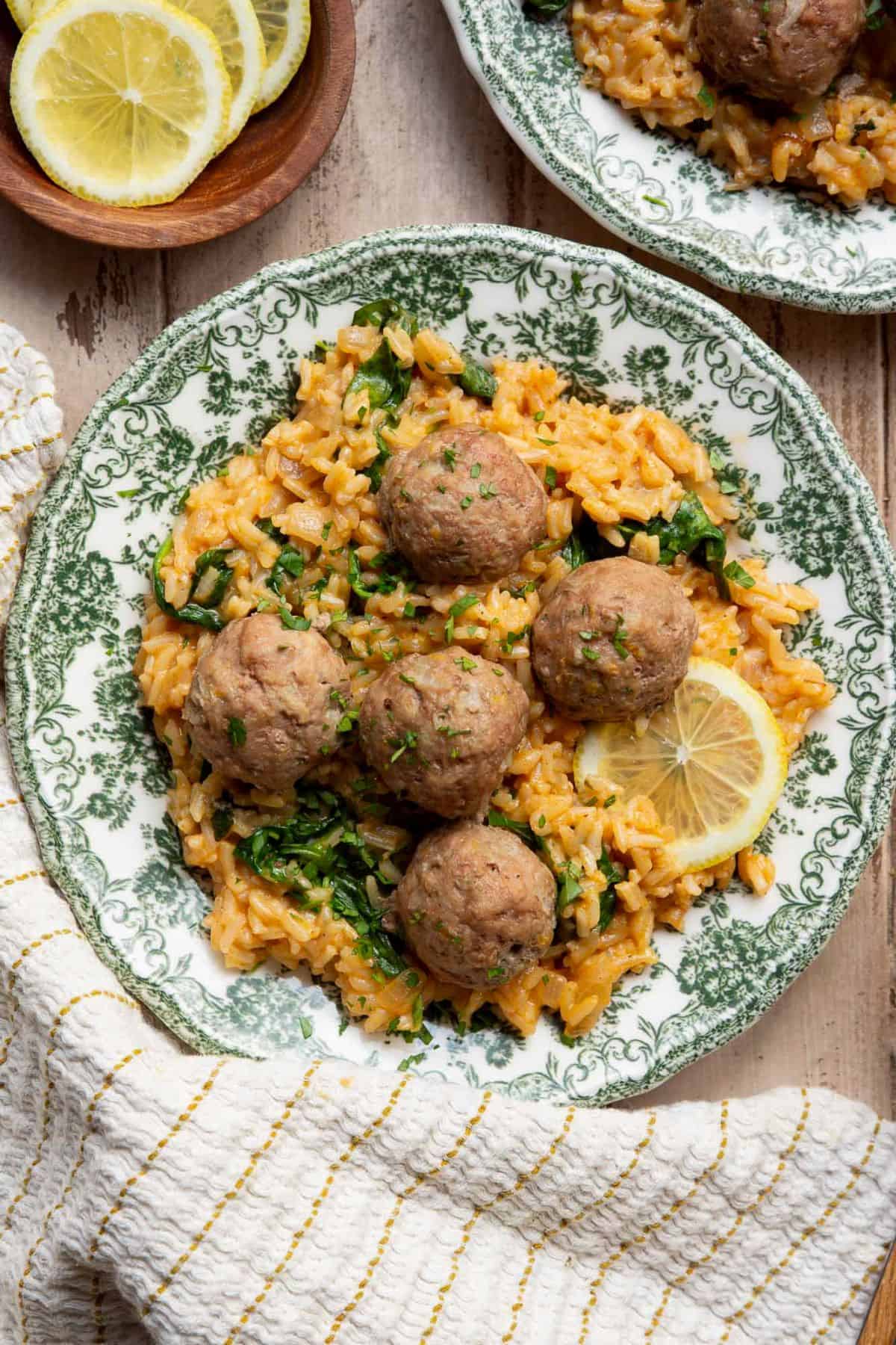 High protein Greek turkey meatballs on top of creamy lemony risotto rice.