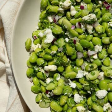 High-protein edamame salad with feta, dill, and apple cider vinegar dressing.